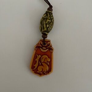 Chinese Animal Pendant. key chain. dog image. From China. Year of the dog.